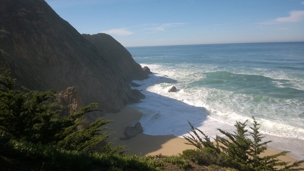 Photo of the beach from the cliff top