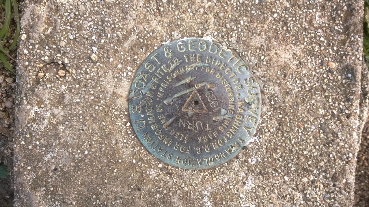 A photo of a marker set up the U.S. Coast and Geodetic Survey